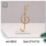 Ornamento in ferro Nota musicale decorativa colore oro dimensioni 12x4,2x22cm