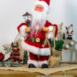 Giocattolo Natalizio Babbo Natale porta regali con lanterna che canta e balla altezza 32cm alimentazione a batteria (2pile non incluse)