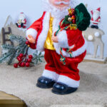 Giocattolo Natalizio Babbo Natale porta regali che canta e balla altezza 35cm alimentazione a batteria (3pile non incluse)