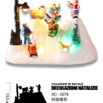 Villaggio Natalizio con pista di ghiaccio luci LED 8 musiche Natalizie (13,5cmH) alimentazione a batterie