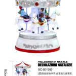Giostra Natalizia in resina con luci LED 8 musiche Natalizie (18,5cmH) alimentazione a batterie