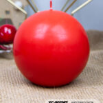 Candela natalizia rossa a forma di sfera in cera dimensioni 10cm