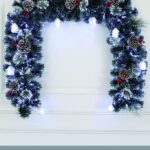 Arco 2 mt, in fibra ottica 120 punte , luce Bianca , bacche rosse ,pigne miste, aghi di pino intrecciati , 8 funzioni