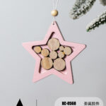 Pendente natalizio in legno a forma di stella rosa e cordino per appenderla dimensioni 10,5x10,5cm