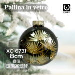 Pallina di Natale nera in vetro da 8cm decorata con palme dorate